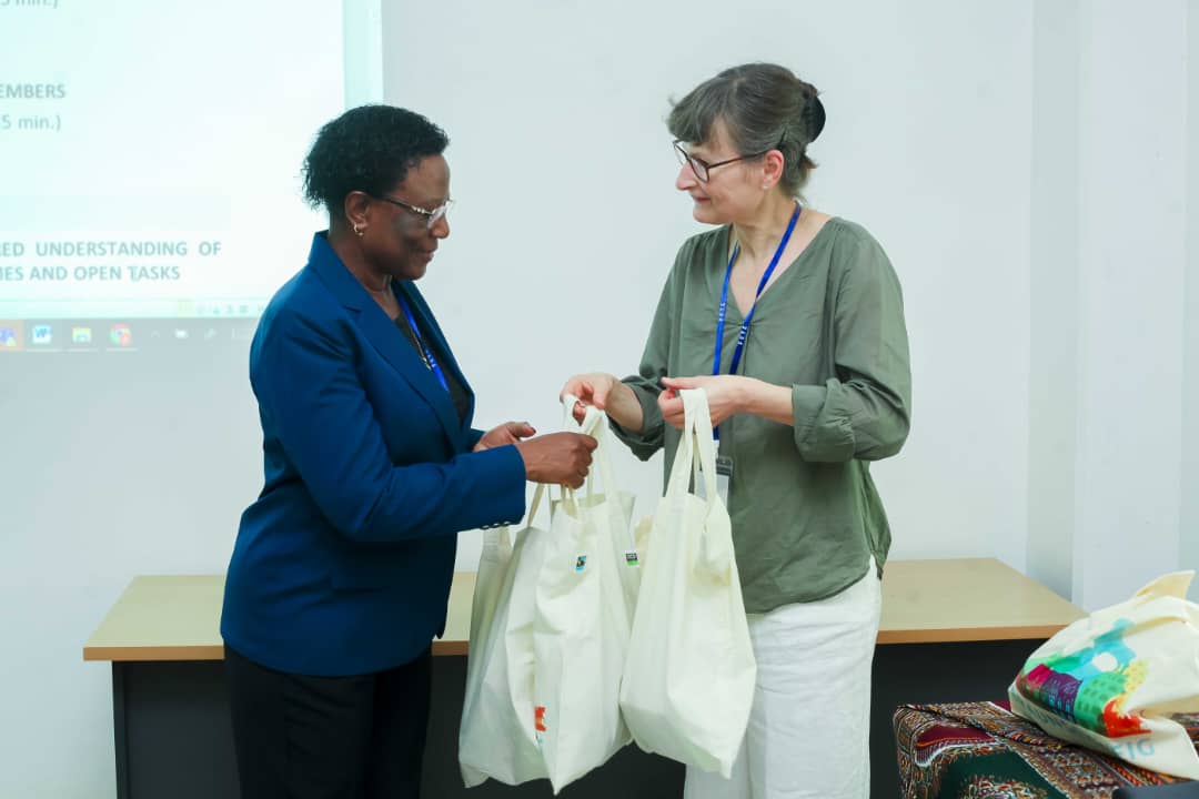 The Principal Researcher of the Project on the Tanzanian side Prof. Joyce Kinabo (Left) receiving a gift from Germany on behalf of the participants handed over by Dr. Jo